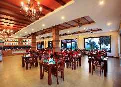 Garden dining and restaurant at Arayal Resorts